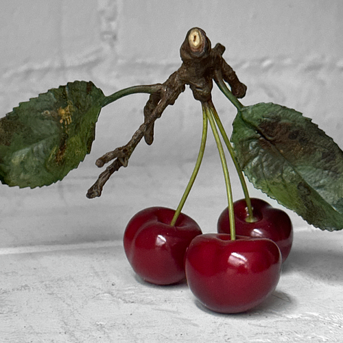 Three Porcelain Cherries with Two Leaves