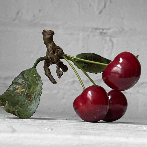 Three Porcelain Cherries with Two Leaves