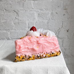 Rosa Torta Pink Cake Slice with Cherry Candle